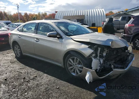 2014 Toyota Avalon Base z USA, uszkodzony, nr VIN 4T1BK1EB0EU085873